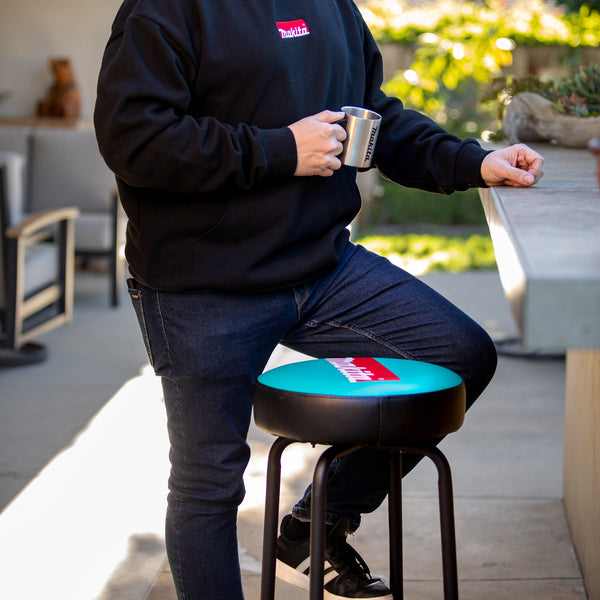 Man using a Makita Barstool